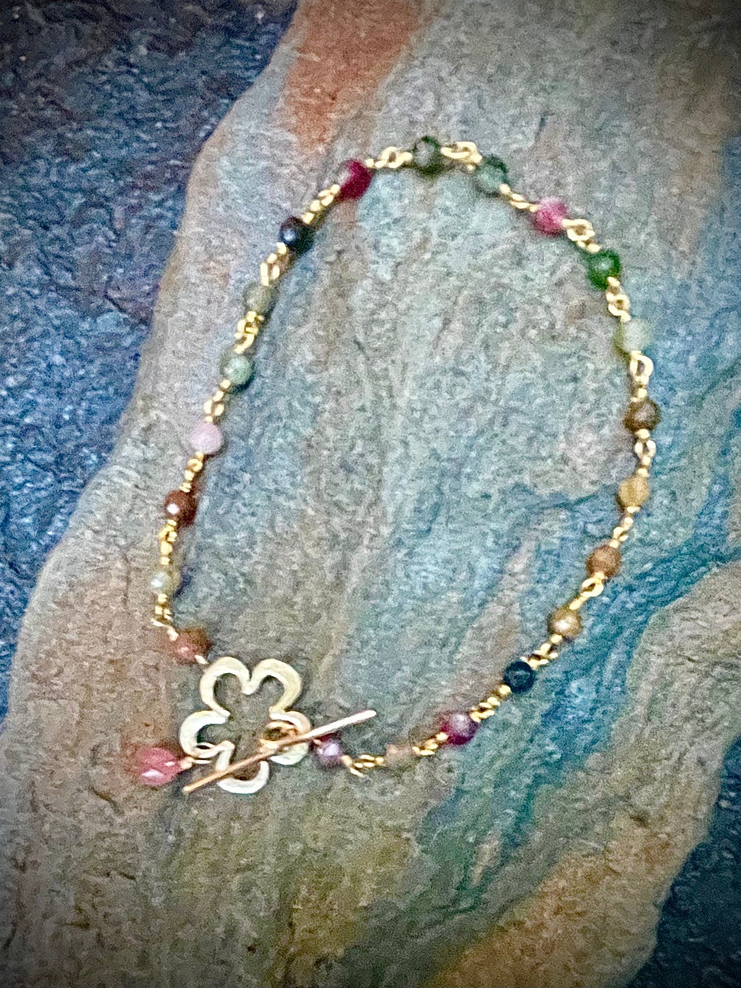 14KT Gold Filled Bracelet With Faceted Round Tourmaline Stones and a Gold Filled Daisy Toggle With Faceted Tourmaline Drop
