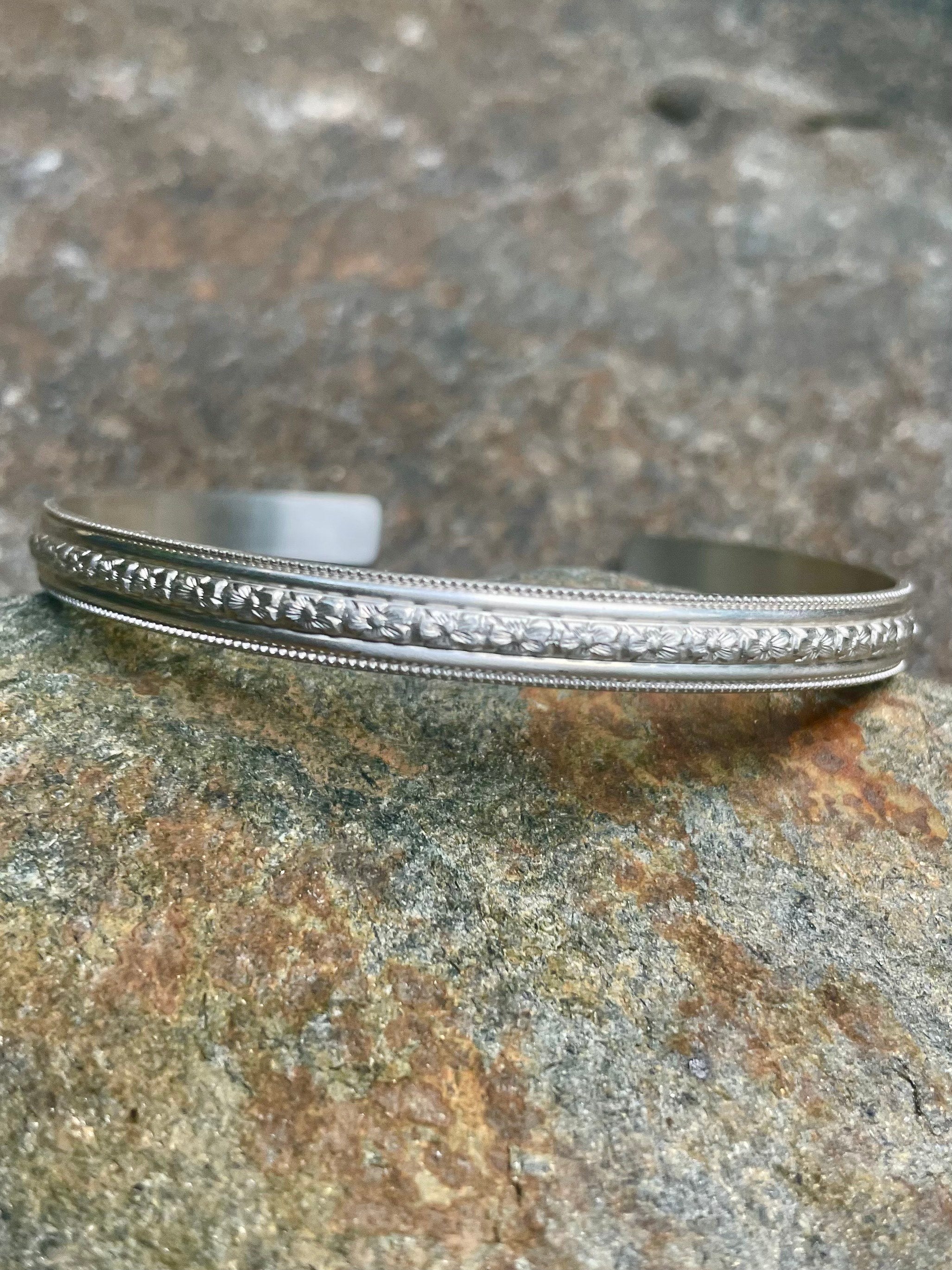 Sterling Silver Open Bangle with Center Floral Motif