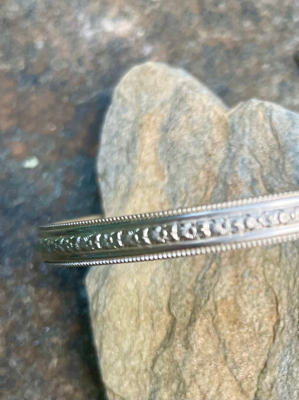 Sterling Silver Open Bangle with Center Floral Motif